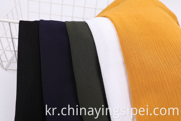 가장 인기있는 공급 업체 직물 주름 100% 레이온 염색 된 Rayon Spun Fabric for Shirts